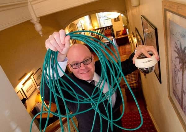 Gary Trotter, who has saved Hardwick Hall Â£10,000 and more than a kilometre of cabling.