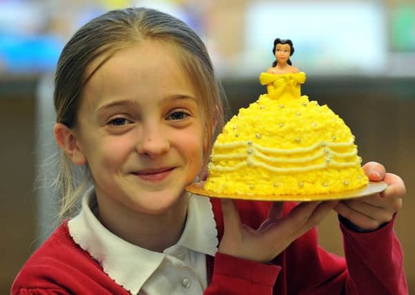 Hutton Henry Primary pupil Abbie Shears with the book character cake she made for World Book Day.