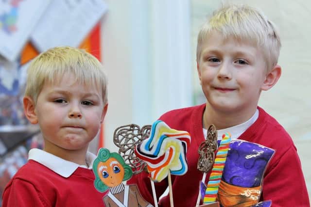 Ben, left, and Thomas Saint with their book character cake they made during World Book Day.