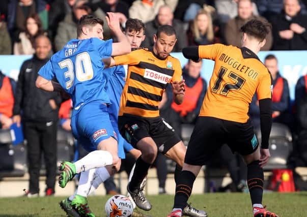 Jake Gray in the thick of the action at Barnet