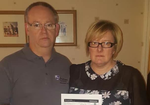 David and Karen Pattinson with confirmation of their tickets to see the now cancelled AC/DC concert in New York's Madison Square Garden