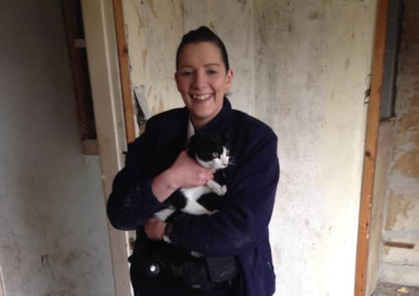Inspector Clare Wilson with Felix the cat