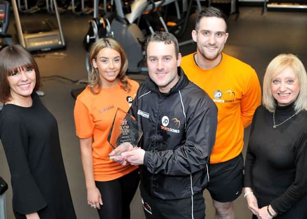 Fitness Zone manager Mark Price (centre front) with staff members (left to right) Maxine Donovan, Dominic Miller, Yasmin Barnes and Lynne Noble.