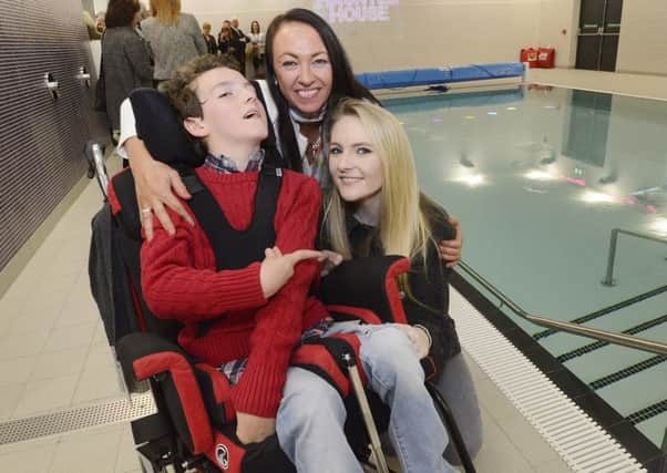 The Percy Hedley Hydrotherapy Pool set up in memory of former Sunderland goalkeeper Tim Carter, was opened by Tims wife Gina, daughter Sasha and son Jensen, a pupil at the school.