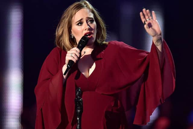 Adele on stage.