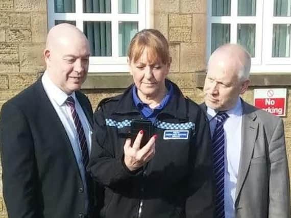 PCSO Marie Garfoot with (left) Ian Shanks from Durham County Council's Education Services and David Kerry, headteacher of Benfieldside Primary School near Consett