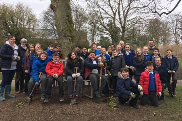 Pupils from Eldon Grove Academy with the Friends of Hartlepools Wild Green Spaces, Hartlepool Countryside team and volunteers from Tesco.