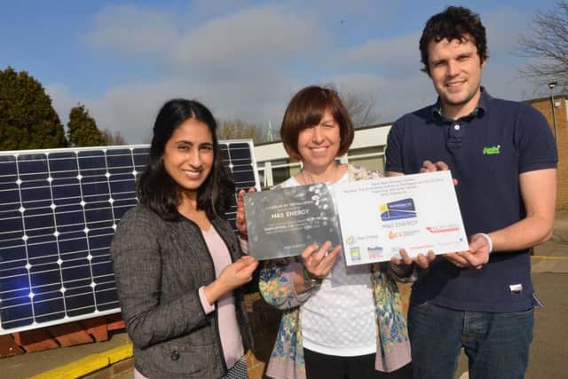 West Park Primary School has become the first solar school in the town. Headteacher Mandy Hall receives plaques from M&S Jindi Pank and Hartlepower CIC Paul Hewitson