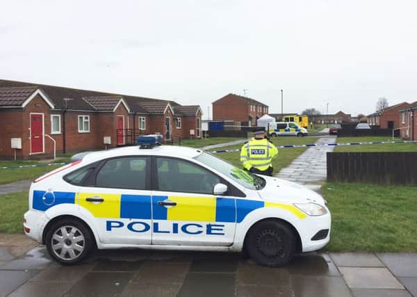 Police at the scene in Byland Close, Redcar, after a man was arrested on suspicion of murdering two women in separate attacks.