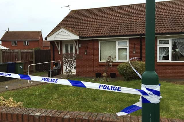 Police at the scene in Mapleton Crescent, Redcar, where the first victim was seriously injured. She later died.
