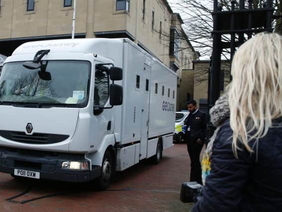 A prison van believed to be carrying Adam Johnson leaves Bradford Crown Court after the footballer has been jailed for six years for engaging in sexual activity with a besotted fan. Picture by Peter Byrne/PA Wire.