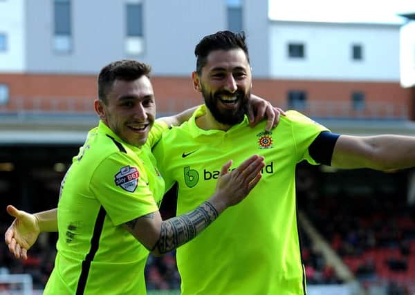 Nathan Thomas (keft) and Billy Paynter celebrate at leyton Orient. Picture by FRANK REID