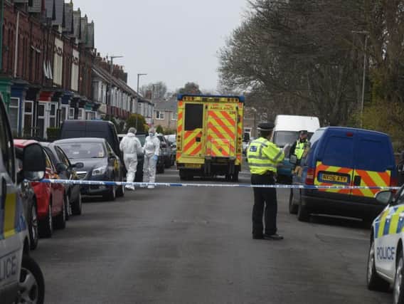 Police after the discovery of Norma Bell's body at her home in Westbourne Road in Hartlepool on Sunday.