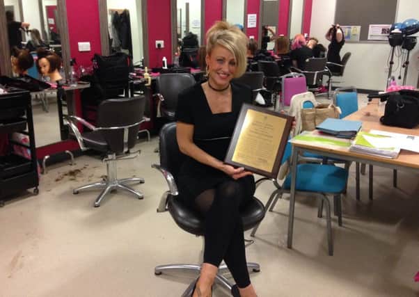 Alison Scattergood with her award from the Hair Council.