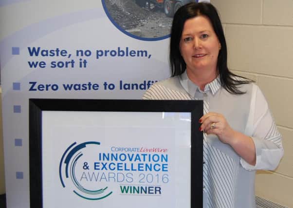 Vikki Jackson-Smith, managing director at J&B Recycling, celebrates her company being crowned as the winner in the Innovation & Excellence Awards.