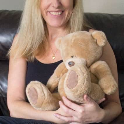 Joanne Shaw with the cleaned up teddy.