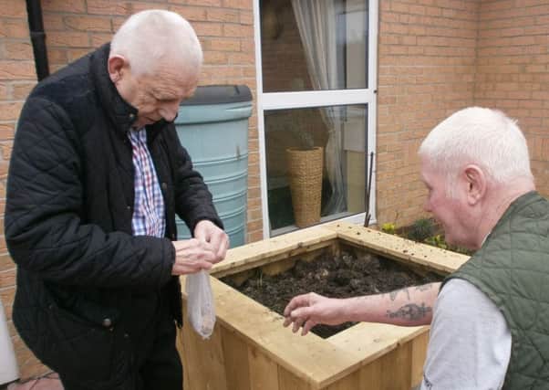 Residents trying out the new raised planters at Field View care home in Blackhall.
