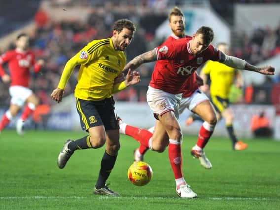 Cristian Stuani (left) in action for Middlesbrough