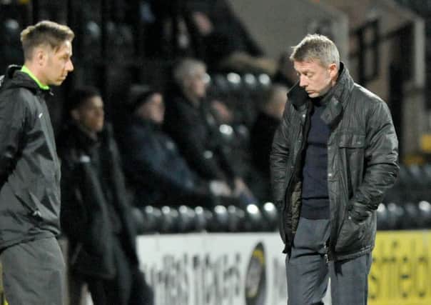 Pools boss Craig Hignett (right) suffers in Tuesday's defeat at Notts County. Picture by Frank Reid