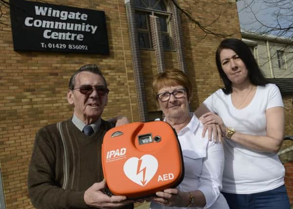 Coun Leo Taylor  with Joyce Collins and Joanne Ridden from Wingate Community Centre and the defibrillator.