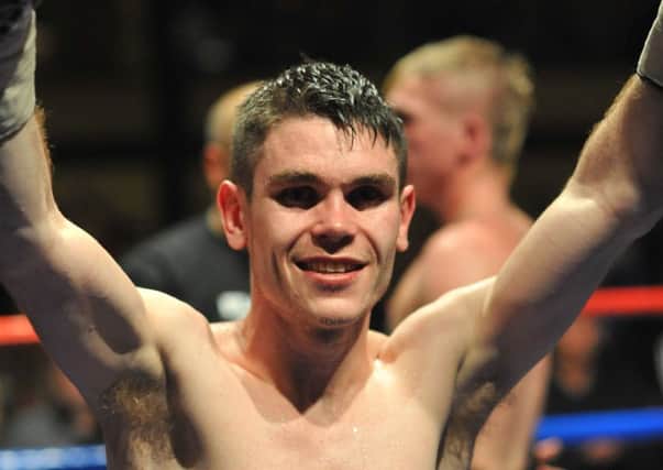 Tommy Ward celebrates his recent win at the Rainton Meadows Arena.