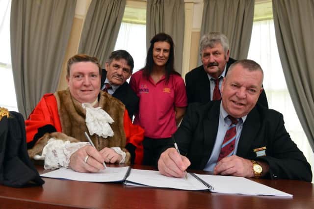 Peterlee mayor Mary Cartwright and Horden RFC president John Groves, with back from left, treasurer Joss Fenwick, Peterlee Town Council sports development officer Sharon Pounder and chairman Trevor Thubron.