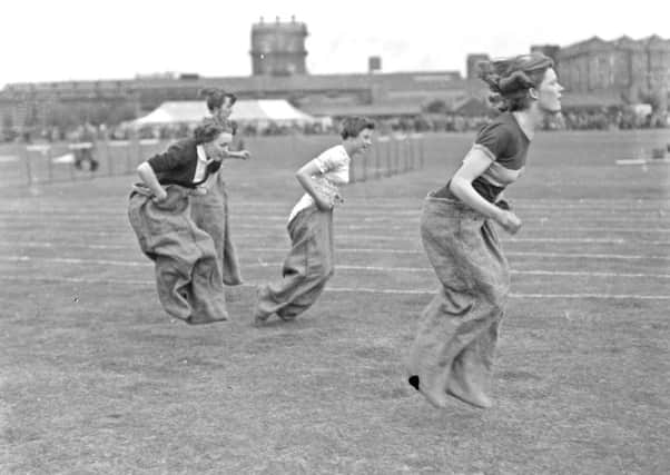 Who are the stars of this ICI sports day sack race?