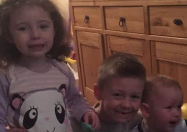 Four-year-old Evie-Lily Crompton (left), nine-year-old Morgan Lund and two-year-old Kyle Crompton