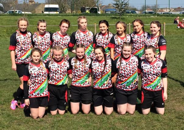 The cup winning Shotton Hall under-15 girls rugby team.