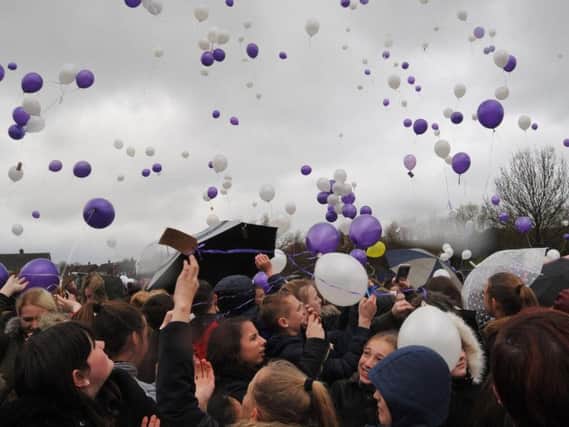 Balloons are released in memory of Morgan Christian Lund and Evie-Lily Crompton at Barnard Grove Primary School.