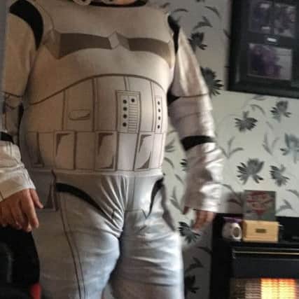 A fan in his stormtrooper costume