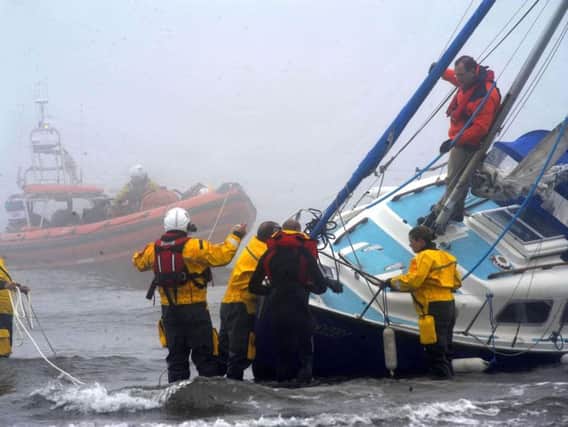 The RNLI comes to the aid of a yacht which had run aground.