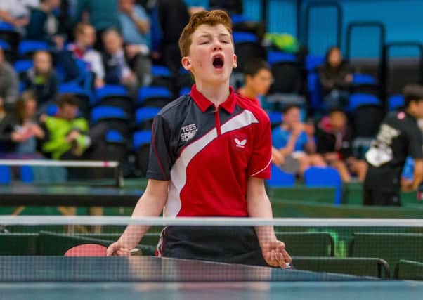 Joe Cope the moment he beat the England Under 15s number six to reach the national table tennis quarter finals. Picture Chris Rayner.