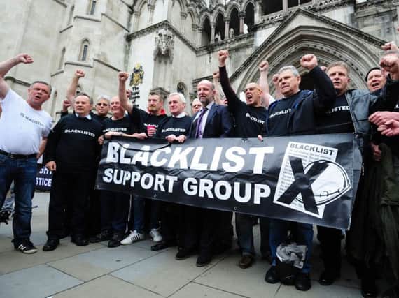 Protesters outside the Royal Courts of Justice, London, before a court hearing relating to the settlement of blacklist litigation.