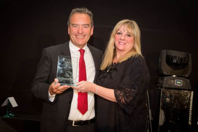 Jeff Stelling receives his Best of Hartlepool award from Joy Yates, Editorial Director of Johnston Press North East