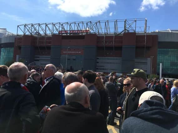 There was a huge crowd outside of Old Trafford after the evacuation. This picture was sent in by Andy Barker.