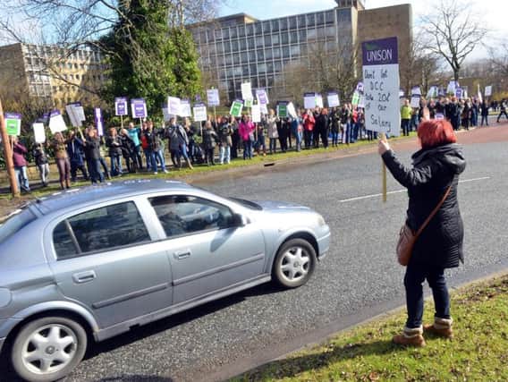 Teaching assistants protest over the plans outside County Hall in Durham last month.