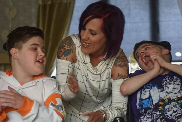 12-year-old twins Corey (left) and Charlie Merrington, of Peterlee Close, Peterlee, who were struck down with duchenne muscular dystrophy aged 4, pictured with mum Marie. Framily and friends are holding charity events to raise funds for a family holiday.