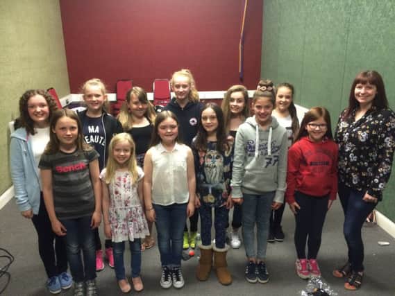 Kate Sirs, right, with her junior choir who are competitng in the Choir of the Year contest at the Sage Gateshead.