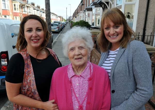 Arncliffe Gardens residents (left to right) Laura McCaffrey, Madje Longhorn (who was at the 1970s party) and Gemma Oliver who are organising the Queens birthday street party in Arncliffe Gardens. Photograph by FRANK REID