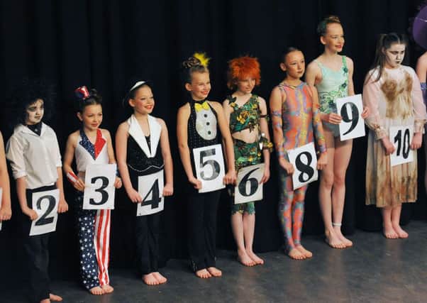 Performers on stage at the end of the Modern Open Class C during the Hartlepool Stage Dance Festival, held in the Town Hall. Photograph by FRANK REID