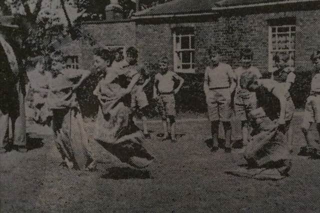 The sack race which attracted some keen competitors at Greatham Feast in 1956.