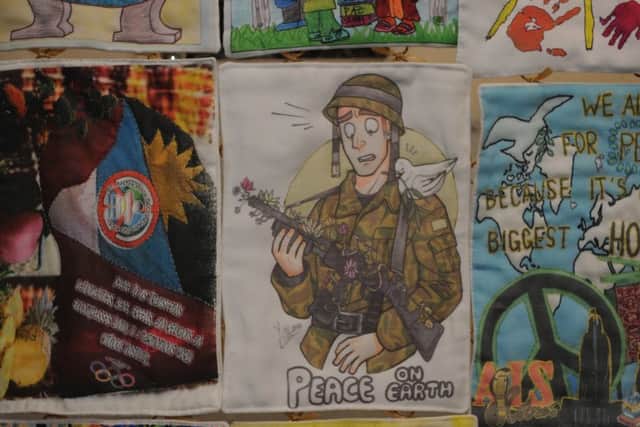 Some of the designs which make up the International Peace Quilt.