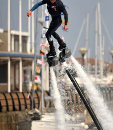 Adam Henderson demonstrating his flyboard skills during the marina event.