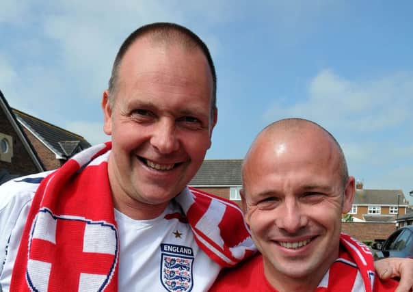 England fans Ian Hendry (white shirt) and Richard Body set of to support England during Euro 2016. Photograph by FRANK REID