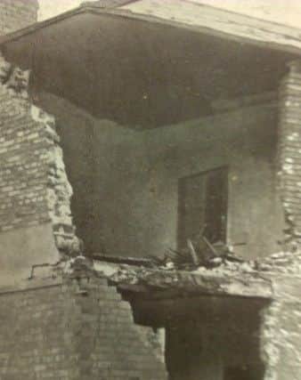 A damaged house in 1914.