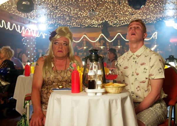 Tim Healy as Lesley and Adam Gillen  as Liam

in the ITV show  Benidorm