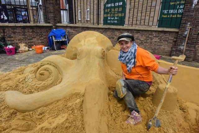 Nicola Wood, of CBBC show Deadly Art, with her sand sculpture at the launch of the National Museum of the Royal Navy in Hartlepool, on Saturday.