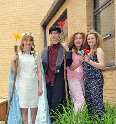 (left to right) Titania (Hattie Wright), Oberon (Daniel Stuart), Puck (Ellie Tabley and Nicole Grey) from the cast of A Midsummer Nights Dream, the first production in the new Manor Academy building. Photograph by FRANK REID