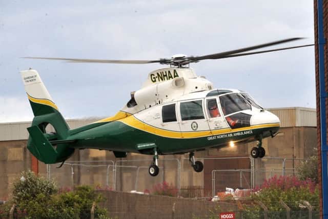The air ambulance pictured taking off from Middleton Road with the casualty on board. Pic by Tom Collins.